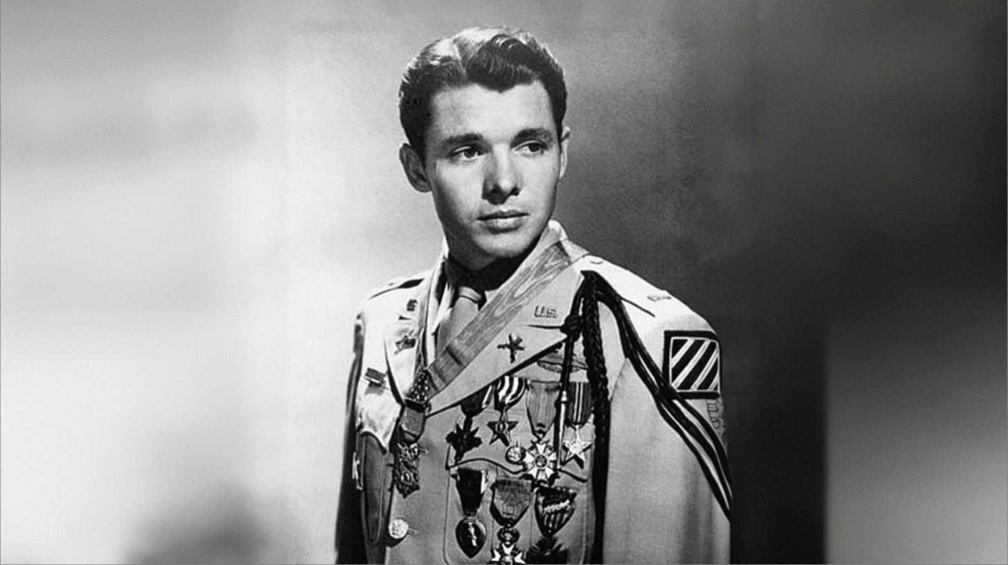 Audie Murphy, the most decorated American soldier of WWII, in uniform wearing his medals