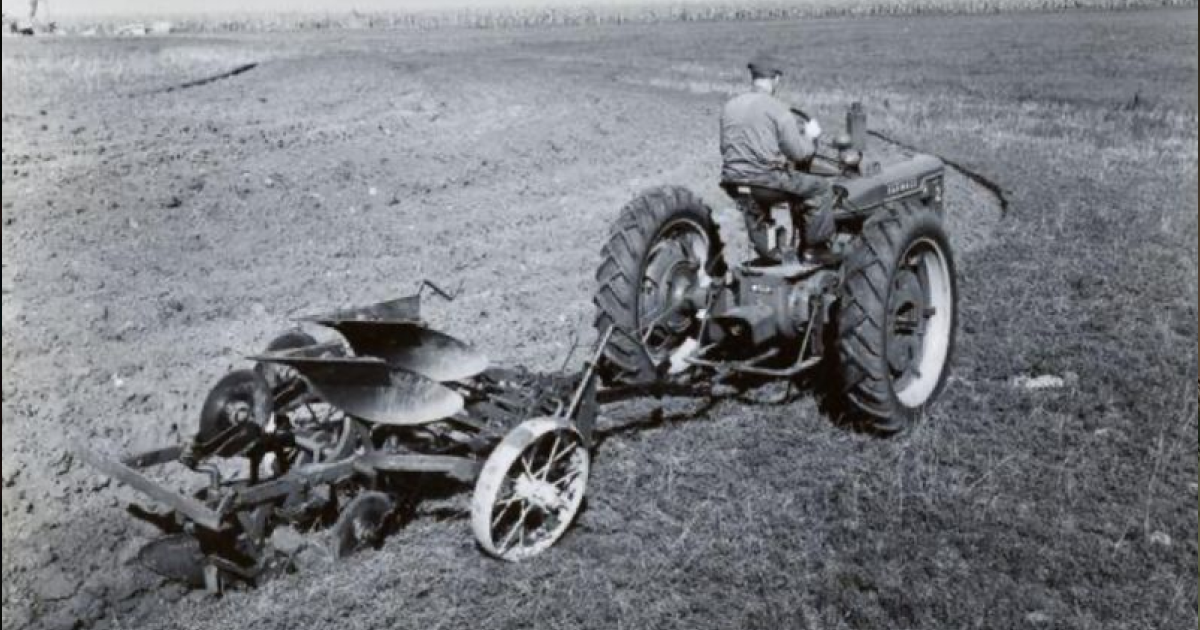 A man in the field with work that can’t wait